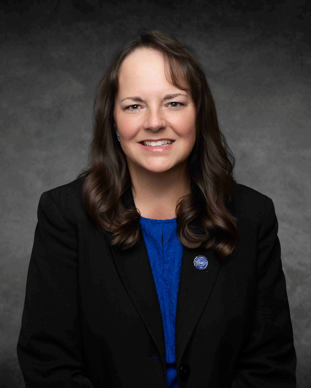 Michelle Shaver, Chief Communications and Marketing Officer, smiling in a headshot