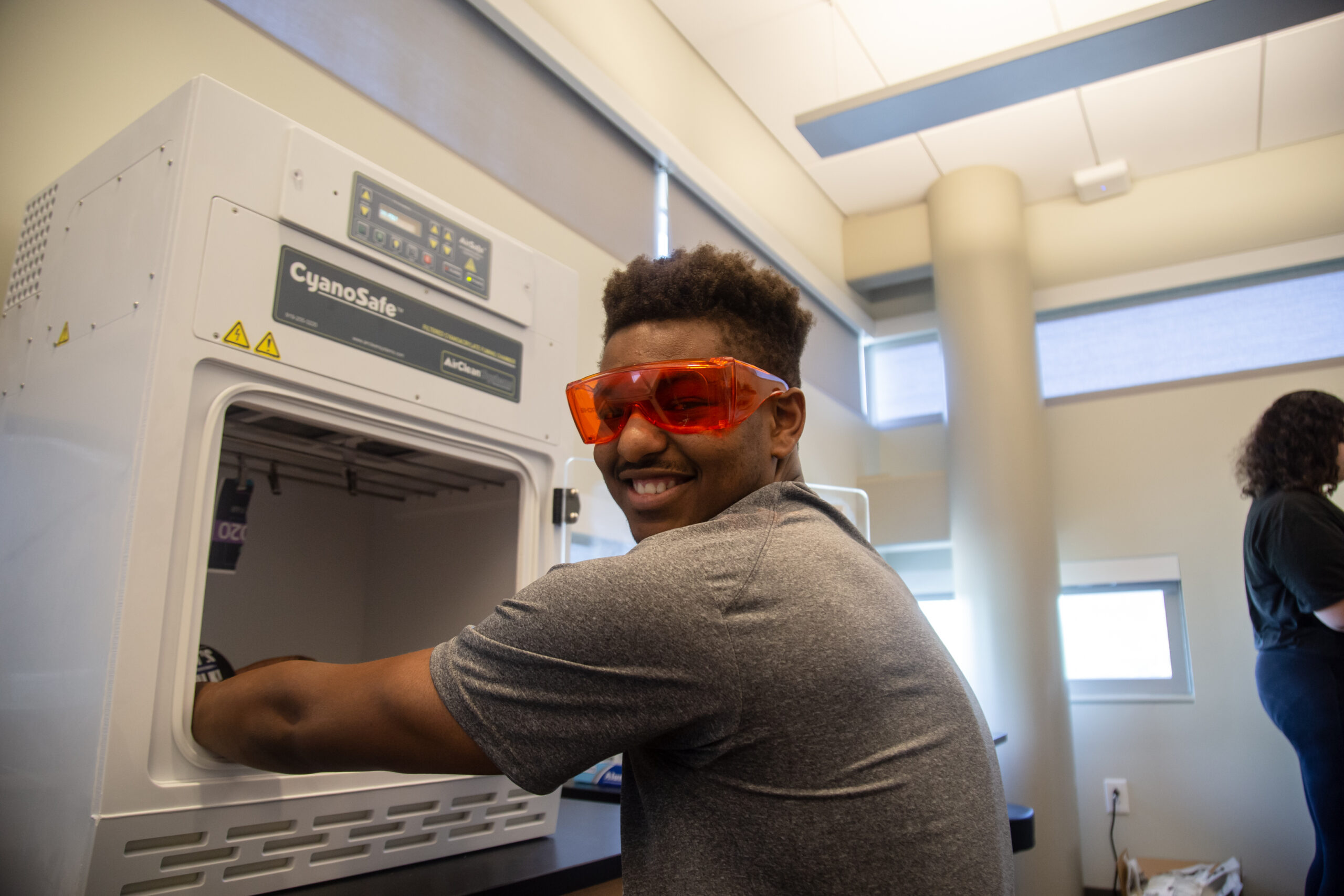 Student working in Crime Lab machines