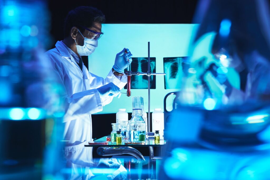 Two researchers are conducting experiment in a laboratory setting.