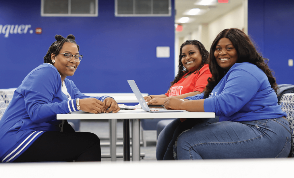 students sitting at a table together