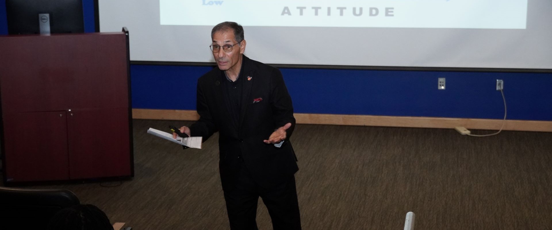 Close up of presenter of a workshop with his presentation.