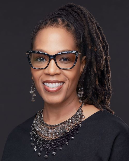 Salisa Williams, Career Advisor for the Career Development Center, smiling in headshot